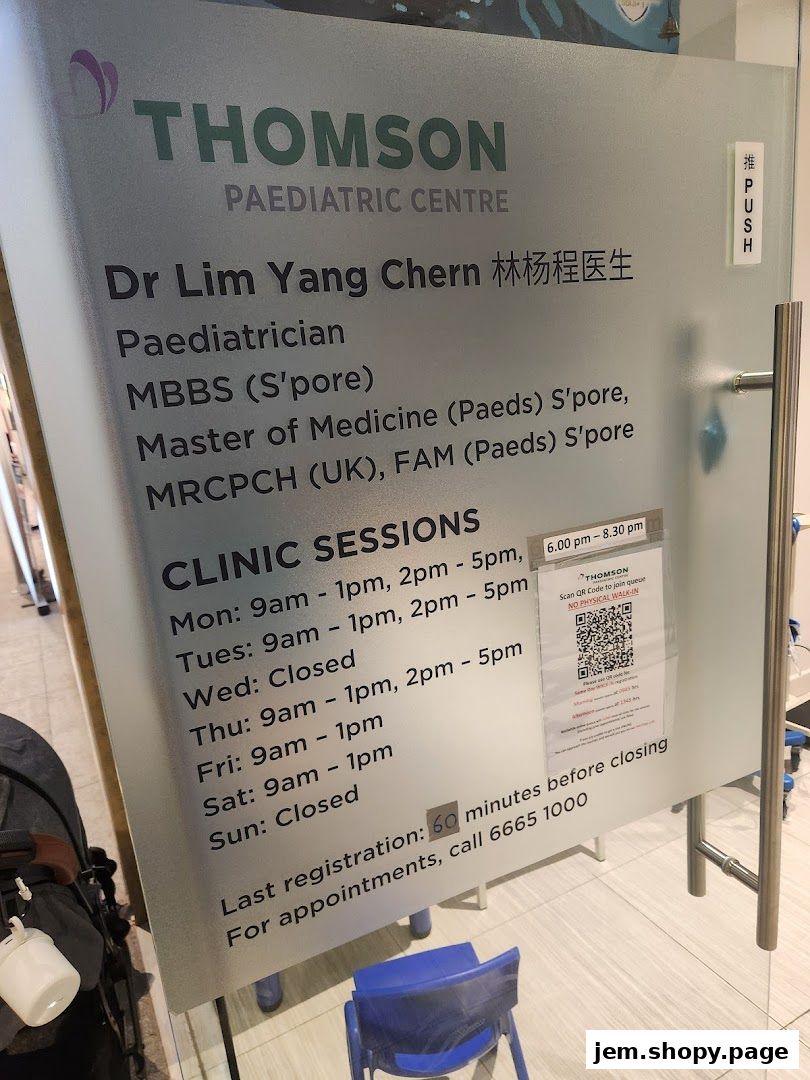 Signage for Thomson Paediatric Centre with clinic hours and doctor's qualifications.
