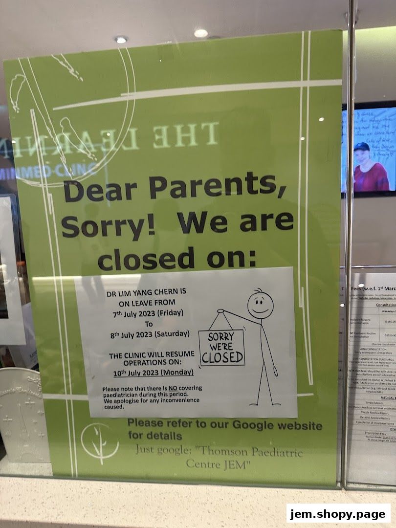 A green sign announcing Thomson Paediatric Centre is closed for Dr. Lim Yang Chern's leave.