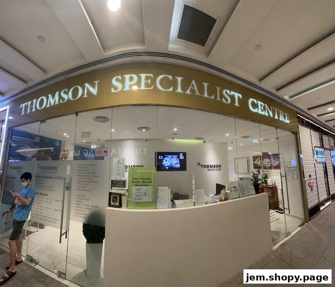 Exterior of Thomson Specialist Centre, a medical clinic with a reception area visible.