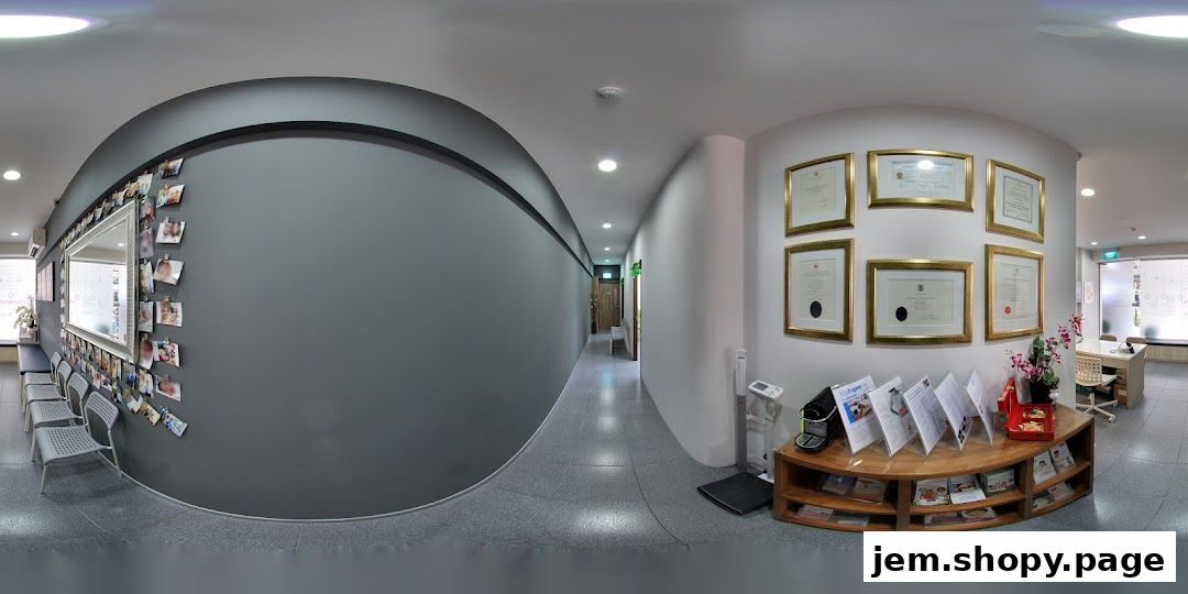 Interior view of a clinic waiting area with framed certificates and brochures on display.