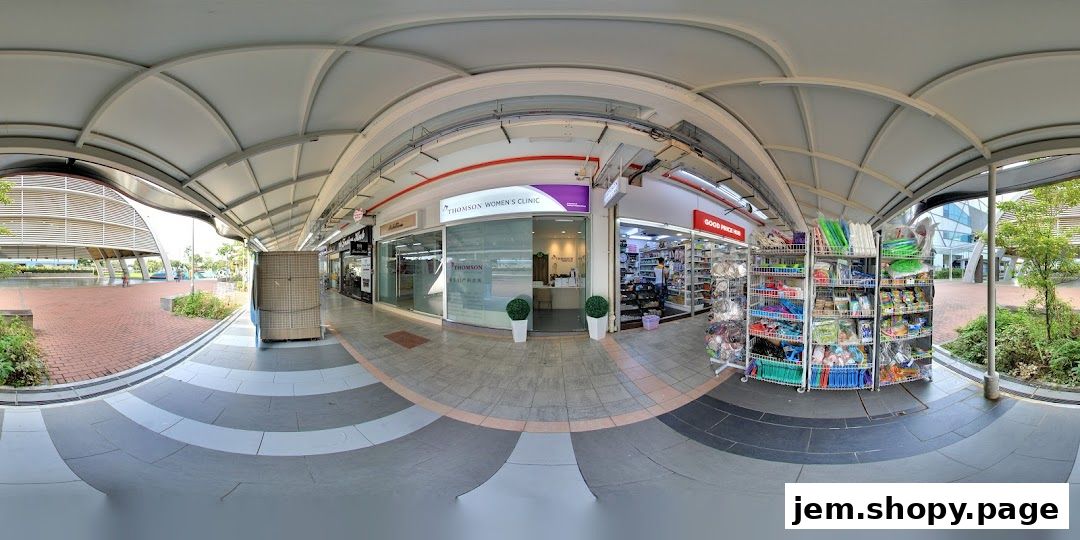 Exterior view of Thomson Women's Clinic and adjacent shops in a covered walkway.