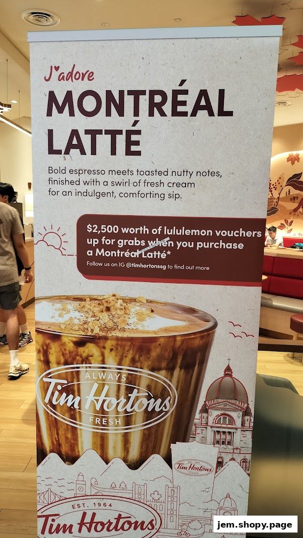 A promotional banner for Tim Hortons' Montréal Latté, featuring a special offer.