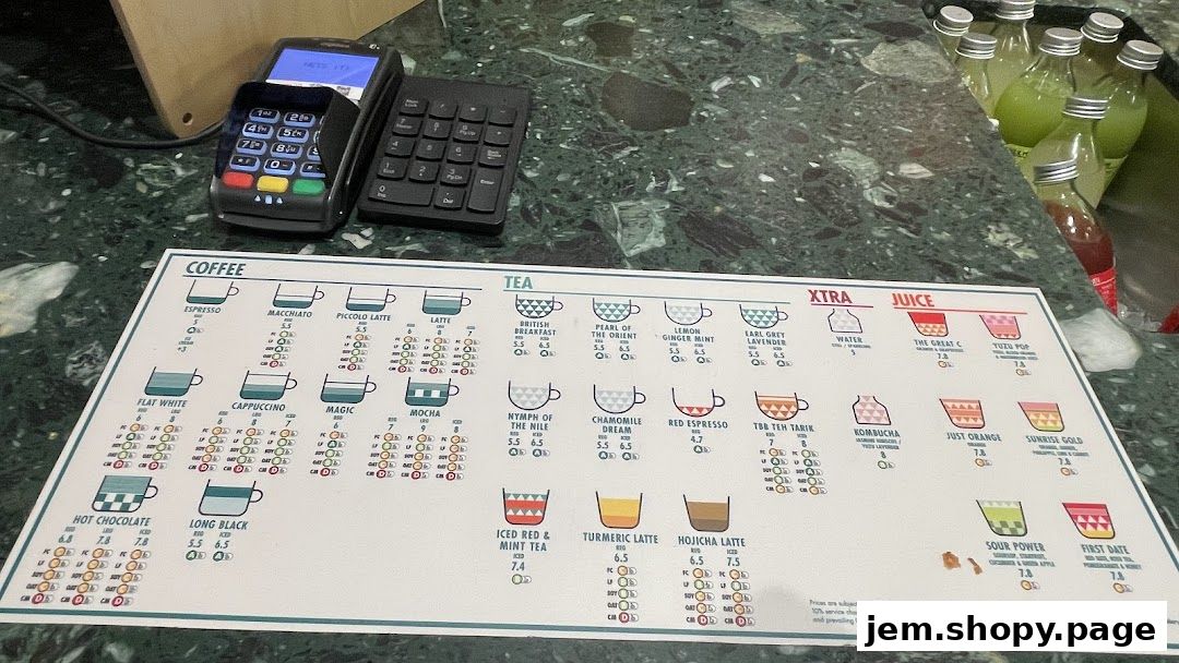 A menu board displaying various coffee, tea, juice, and other beverage options with prices.