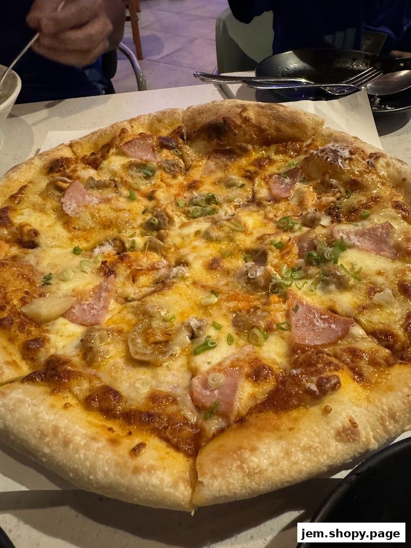 A close-up shot of a delicious pizza with various toppings and a golden crust.