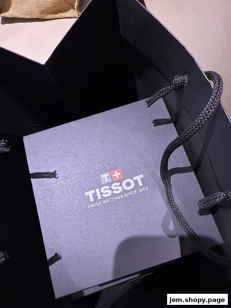 A Tissot branded gift box inside a shopping bag.