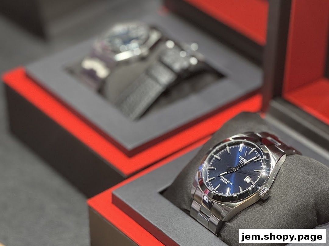 Close-up of a Tissot watch with a blue dial on display.