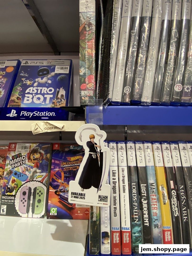 A shelf displaying various PlayStation and Nintendo Switch video games, including popular titles and new releases.