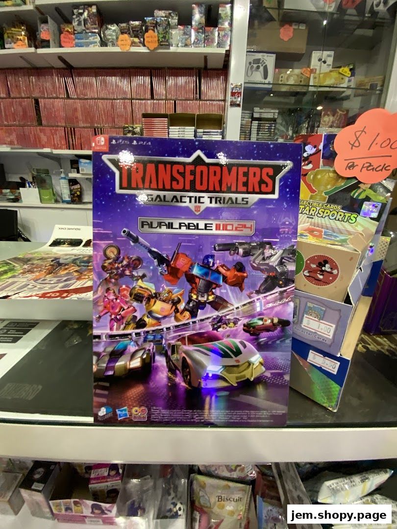 A display of Transformers Galactic Trials game and collectible cards in a retail store.