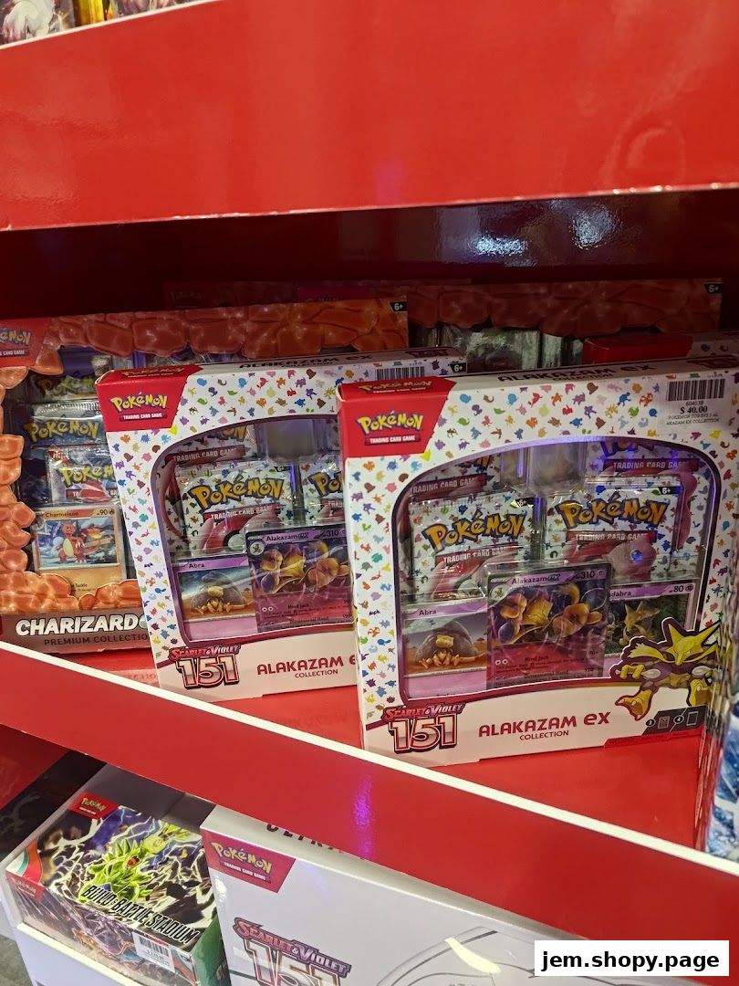 Pokemon trading card game Alakazam EX collection boxes displayed on a shelf.