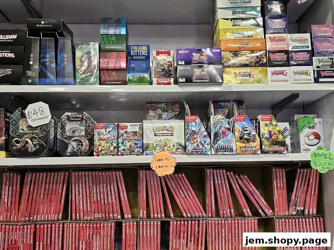 Shelves stocked with trading card game products and video games.