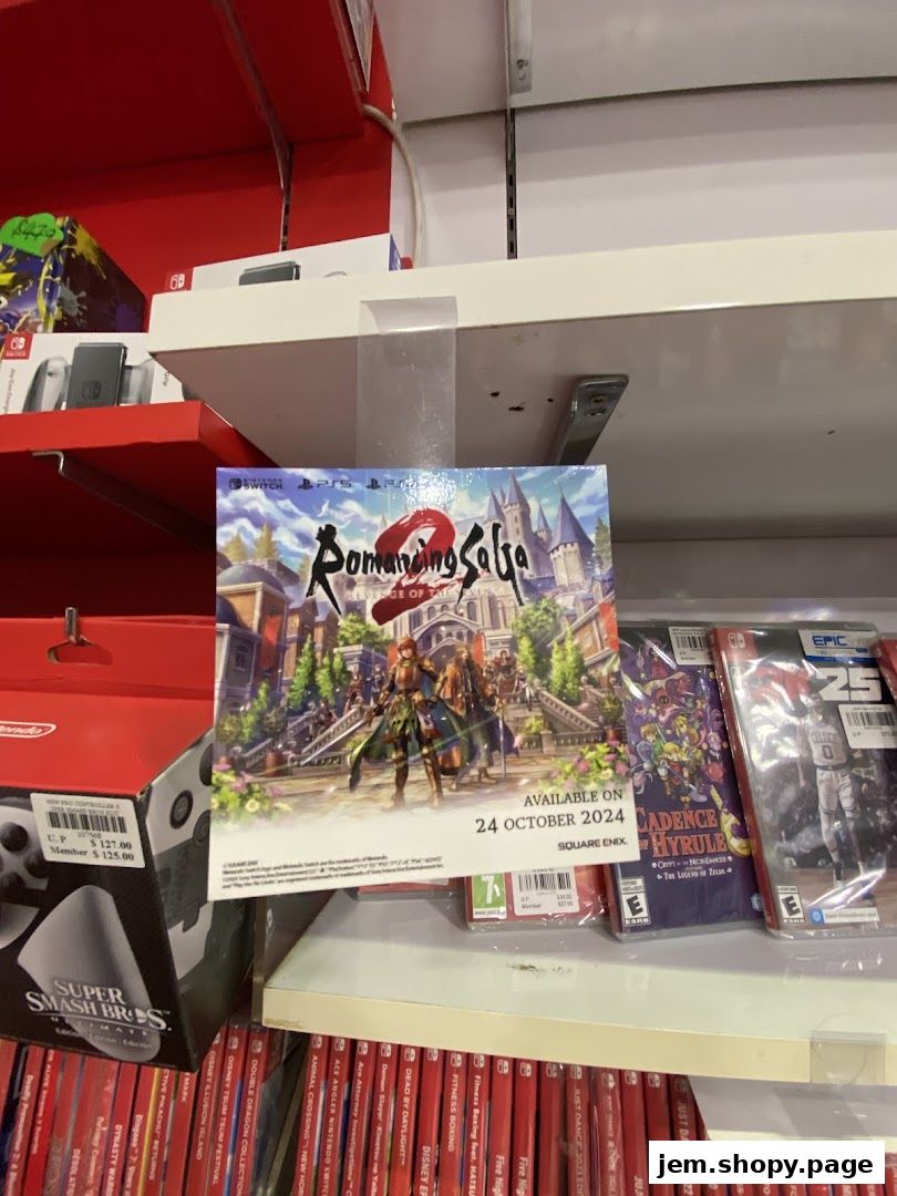 A display of video games, including 'Romancing SaGa' and 'Cadence of Hyrule', on shelves.