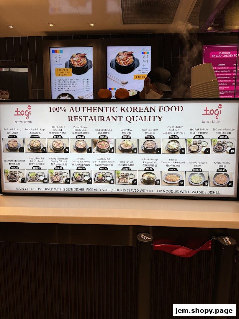 A menu board for Togi Korean Kitchen displaying various Korean dishes and their prices.