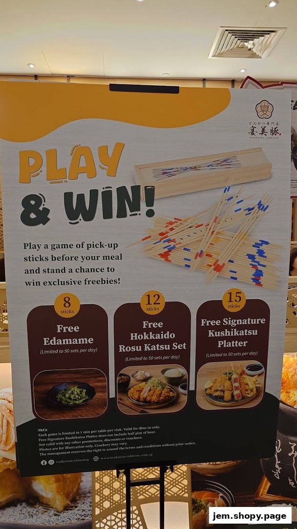 A promotional poster for Tonkatsu ENbiton Jem offering freebies with a pick-up sticks game.