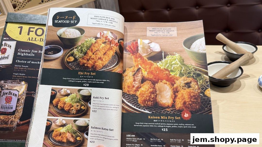 A menu from Tonkatsu ENbiton Jem showcasing various fried sets and add-ons.