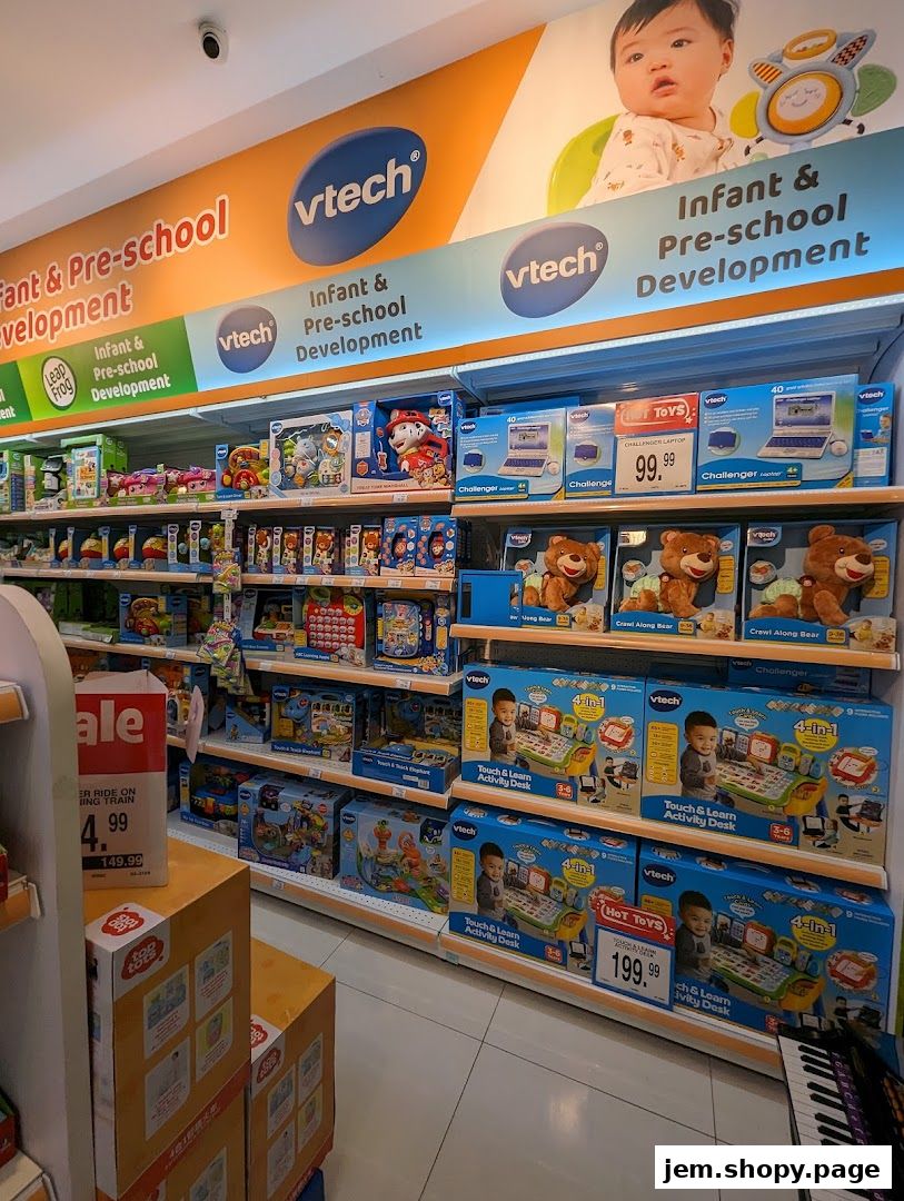 A wide selection of VTech infant and pre-school development toys are displayed on shelves.
