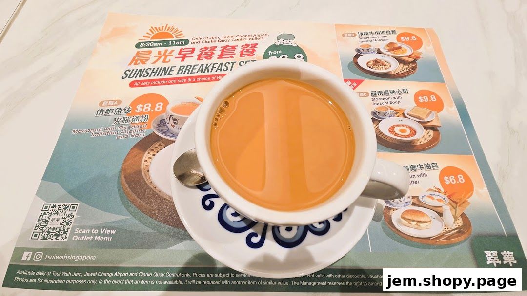 A close-up of a cup of milk tea on a placemat menu from Tsui Wah.