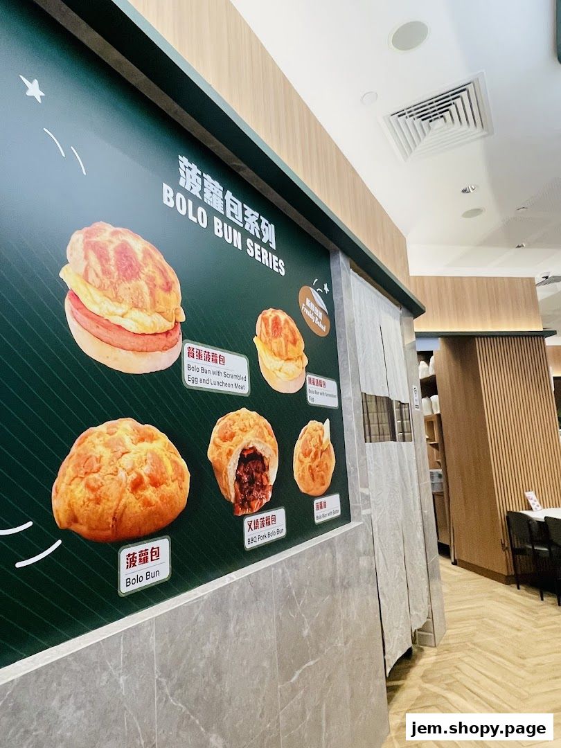A wall display showcasing various types of Bolo Buns from Tsui Wah.