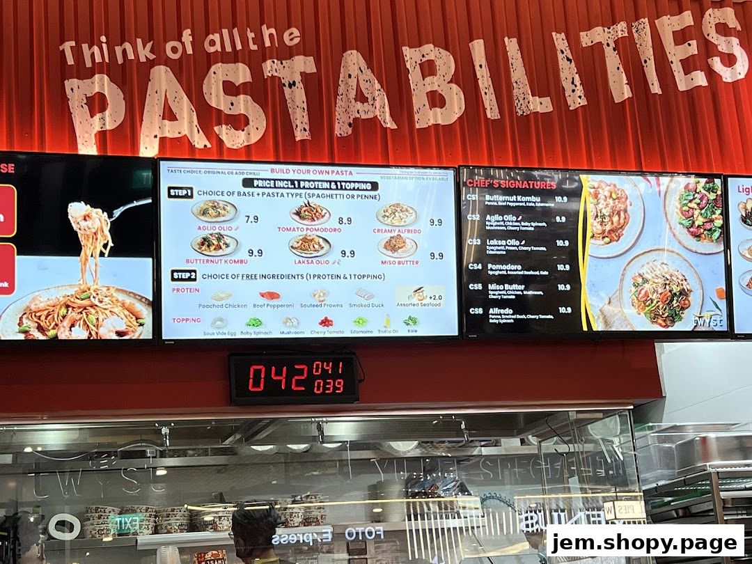 A digital menu board displaying pasta options, ingredients, and chef's signature dishes.