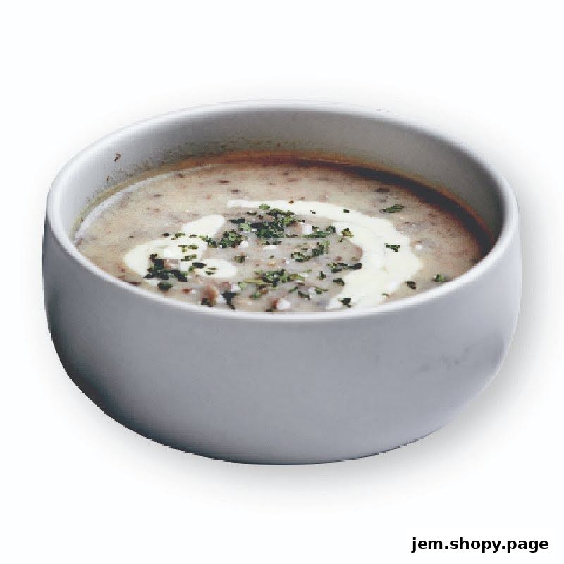 A close-up shot of a bowl of creamy mushroom soup with a swirl of cream and herbs.