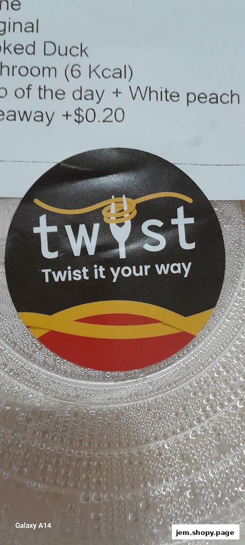 A close-up of a Twyst sticker on a clear plastic container with condensation.