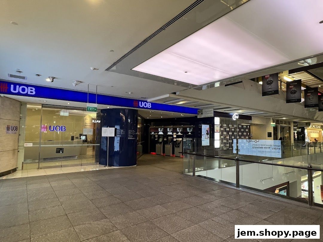 The UOB Bank branch entrance with ATMs and signage visible.