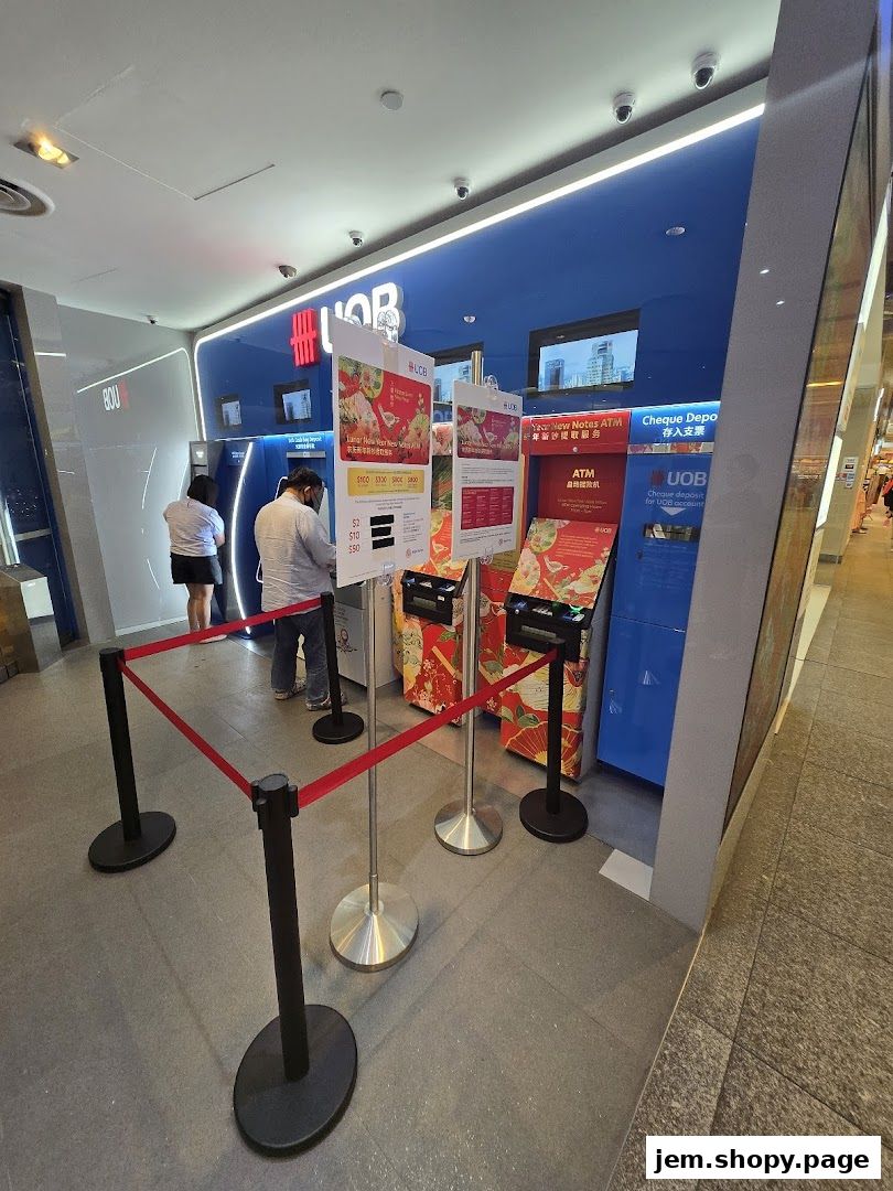 UOB Bank branch with ATMs and queue barriers, featuring Lunar New Year promotions.
