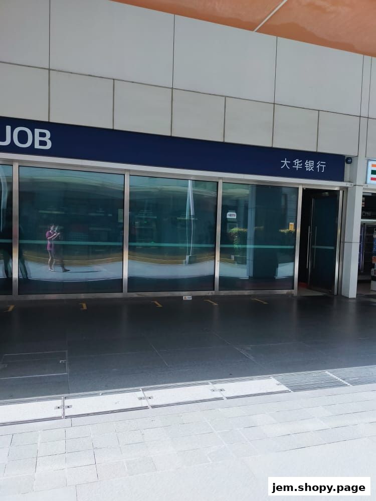 The exterior of the UOB Bank branch at Jem, featuring its signage and glass entrance.