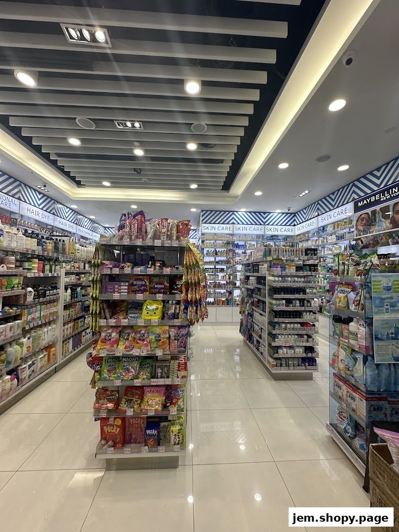 A well-lit beauty store aisle stocked with skincare, hair dye, and snacks.