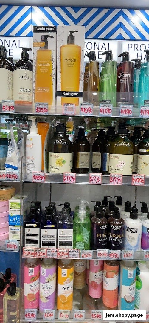 Shelves stocked with various body wash and shower gel products from brands like Neutrogena and St. Ives.