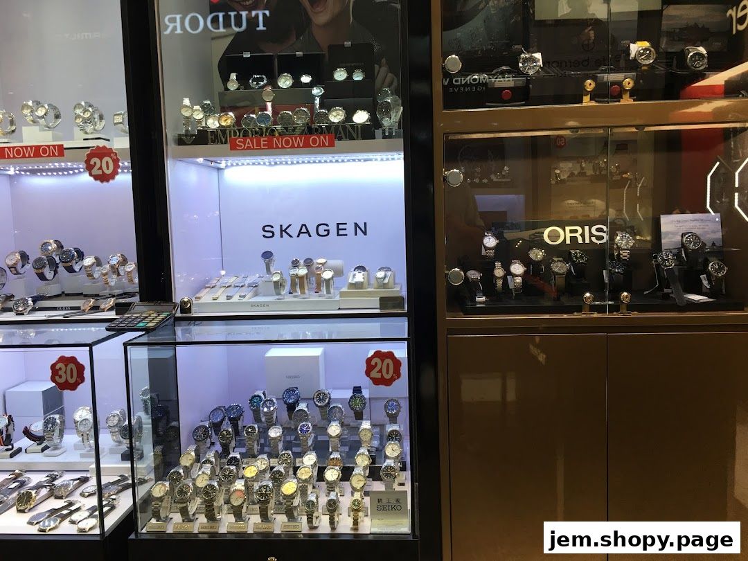 A retail display showcasing various watch brands like Tudor, Skagen, Oris, and Seiko.