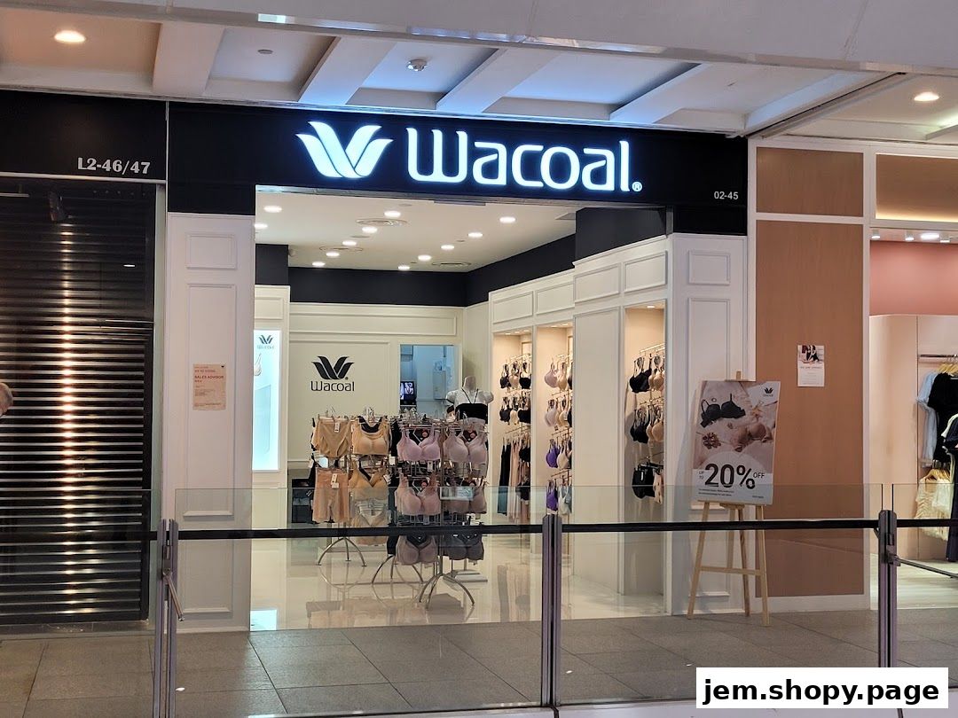 The entrance of a Wacoal lingerie shop displaying bras and offering a 20% off sale.
