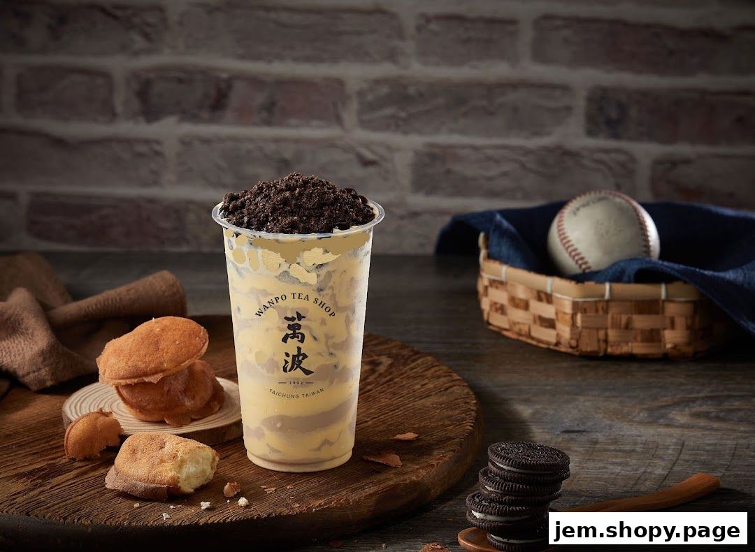 A creamy beverage topped with crushed cookies, served with pastries and cookies.