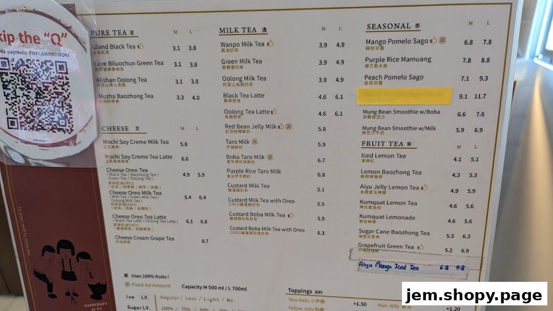 A menu from Wanpo Tea Shop showing various tea and smoothie options with prices.