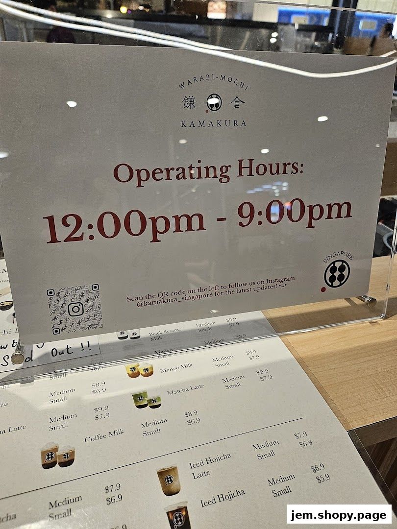 A menu board for Warabi-Mochi Kamakura displaying operating hours and drink options.