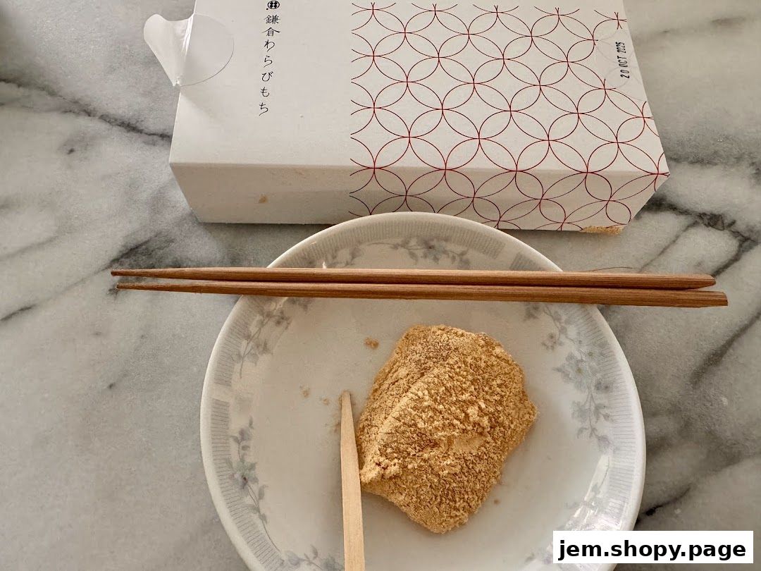 A plate with warabimochi, chopsticks, and a box from Warabimochi Kamakura.