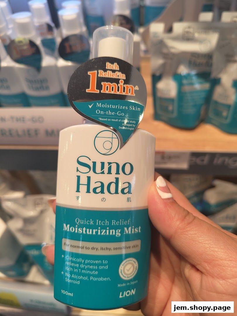 A hand holds a bottle of Suno Hada Quick Itch Relief Moisturizing Mist.