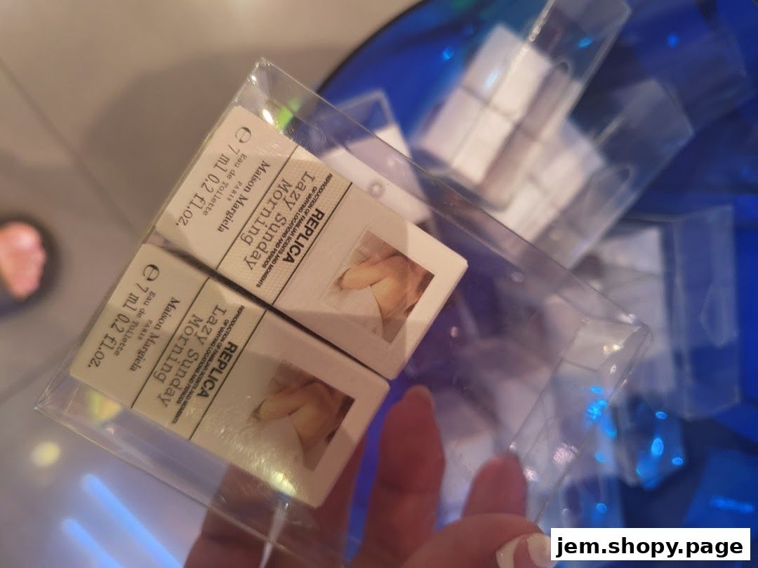 Close-up of Maison Margiela 'Lazy Sunday Morning' perfume samples.