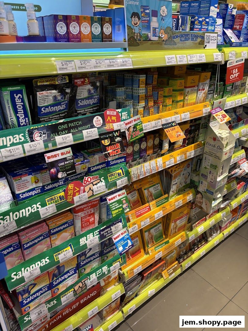 Shelves stocked with various pain relief patches, lotions, and health products from brands like Salonpas and GNC.