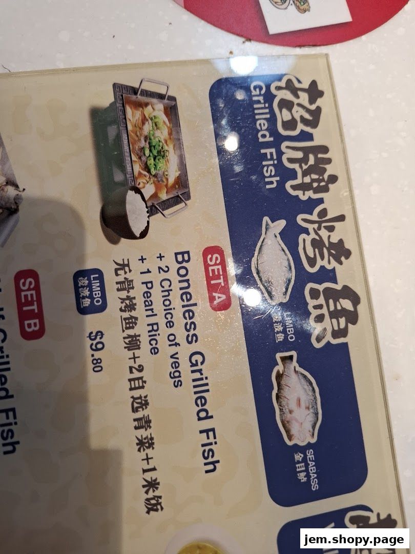 A menu featuring boneless grilled fish with sides and rice options.