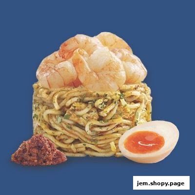 A serving of noodles topped with shrimp, with a side of chili paste and a halved soft-boiled egg.