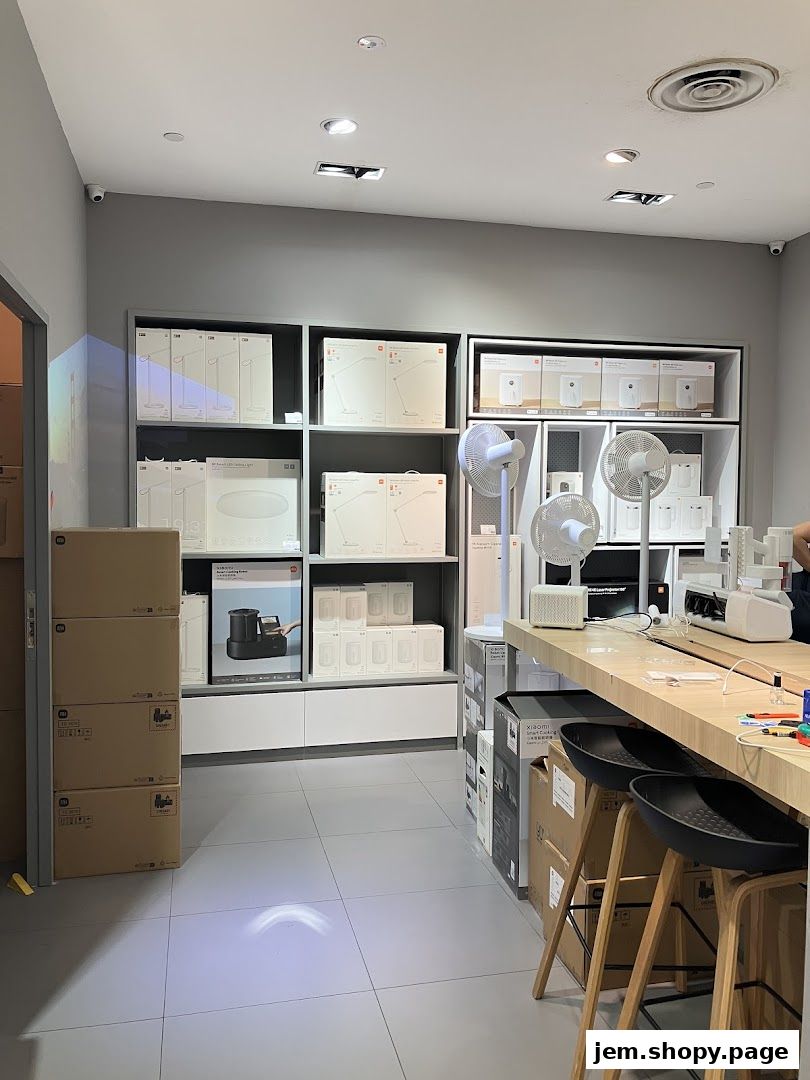 Interior of a Xiaomi store showcasing various electronic products and appliances on shelves and a counter.