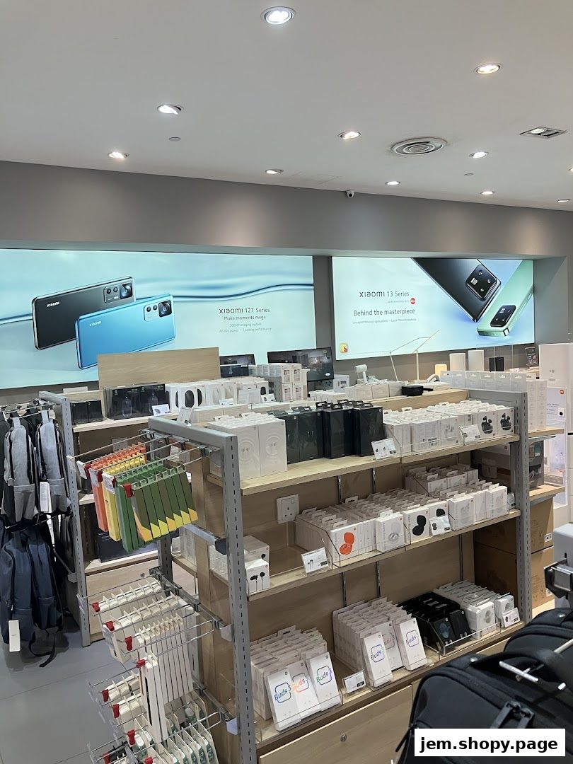Interior of a Xiaomi store showcasing smartphones and accessories on shelves.
