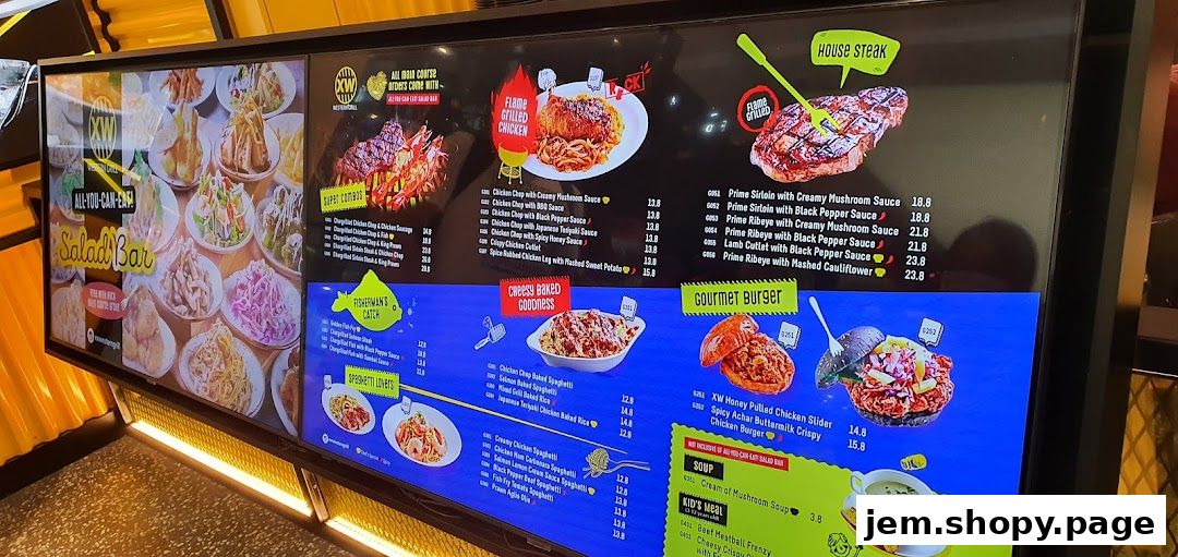 A digital menu board displaying various food items from XW Western Grill.