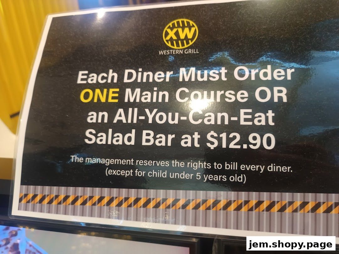 Sign for XW Western Grill offering a main course or all-you-can-eat salad bar for $12.90.