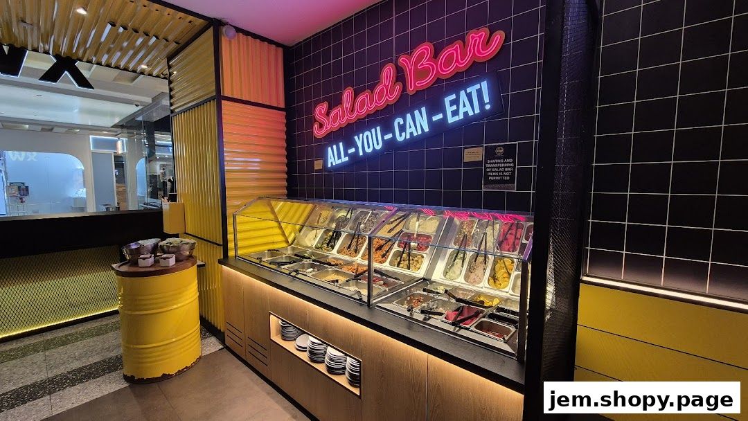 A vibrant salad bar with neon signage and a variety of fresh ingredients.