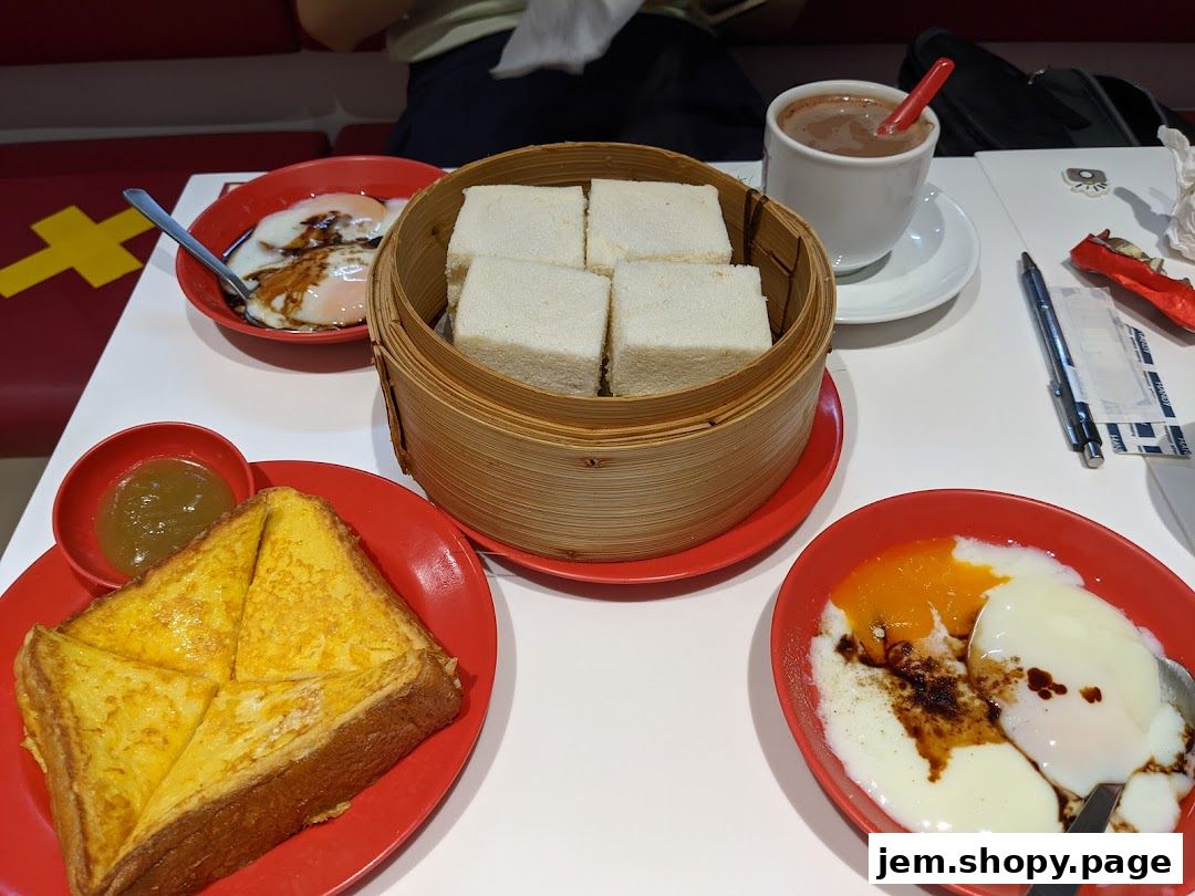 A table laden with traditional Singaporean breakfast items from Ya Kun Kaya Toast.