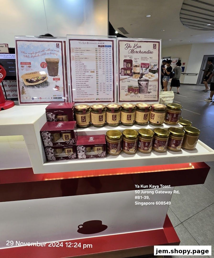 Ya Kun Kaya Toast display featuring beverages, merchandise, and kaya jars.