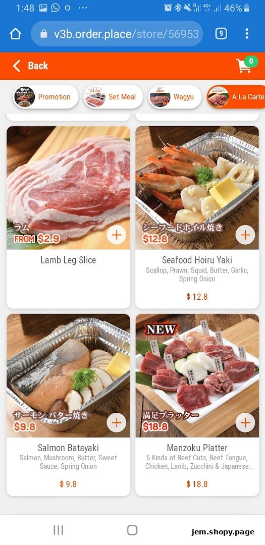 A display of various Yakiniku dishes and ingredients available for order.