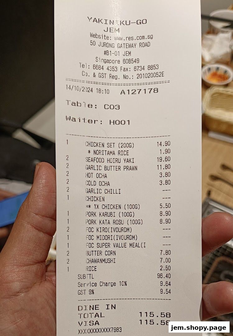 A receipt from Yakiniku-GO JEM detailing food items and prices.