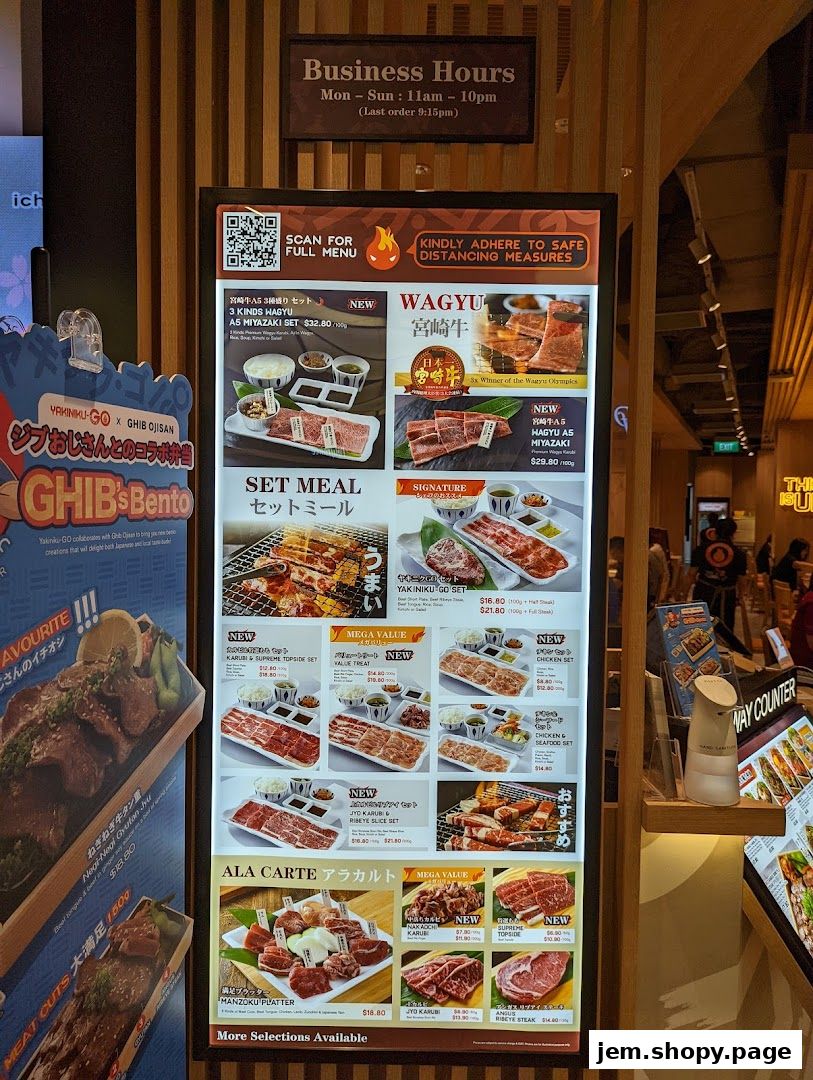 A menu board displaying various Yakiniku set meals and a la carte options with prices.